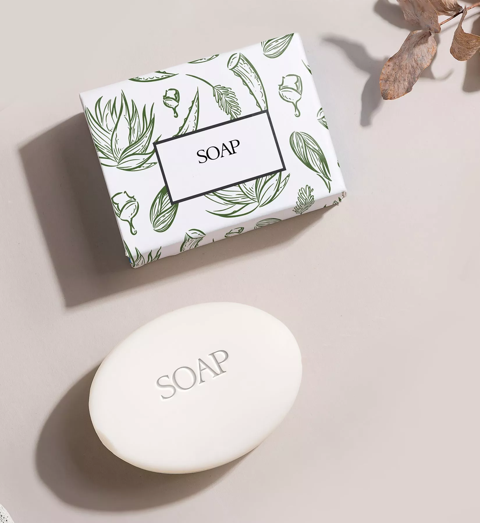 White soap boxes with green botanical illustrations